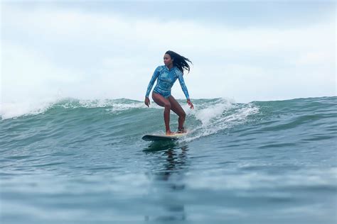 Woman Surfing In Sea Photograph By Konstantin Trubavin Fine Art America