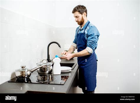Husband Doing Housework Hi Res Stock Photography And Images Alamy