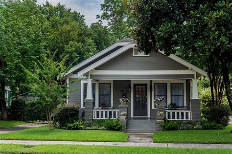 Strong, clean lines adorned with beautiful gables, rustic shutters, tapered columns. american double gable two story bungalow - Google Search ...
