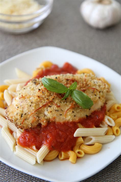 They're crunchier than any baked. Garlic Parmesan Panko Crusted Chicken Parmigiana Recipe