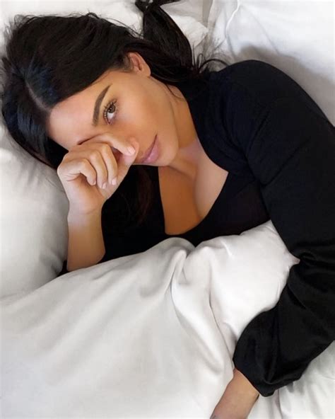 Kim Kardashian Flaunts Cleavage In Revealing Underwear While Posing