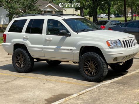 2000 Jeep Grand Cherokee With 18x8 30 Black Rhino Arches And 32105r18
