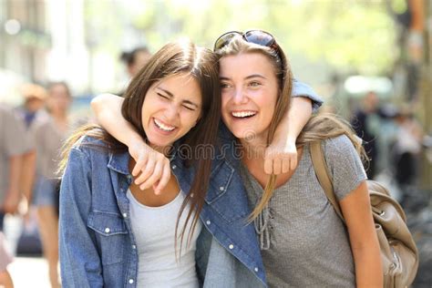 Stock Photo Friends Laughing Teenage Friends Laughing And Hanging Out