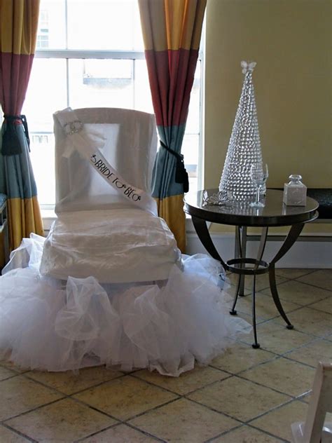 Cute tools in the chairs for them. for all things creative!: All White Bridal Shower from Reader!