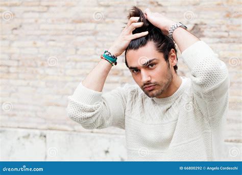 Cool Young Man Fashion Model Hairstyle Hand In The Hair Stock Photo