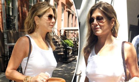 jennifer aniston flashes nipples as she goes braless in tight white vest celebrity news