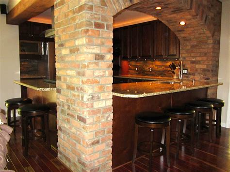 Check spelling or type a new query. Brick archway flanked by kitchen cabinets with a breakfast ...