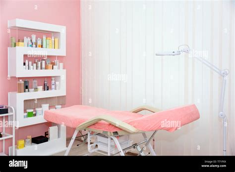 Cosmetologist Cabinet With Massage Table In Modern Beauty Saloon