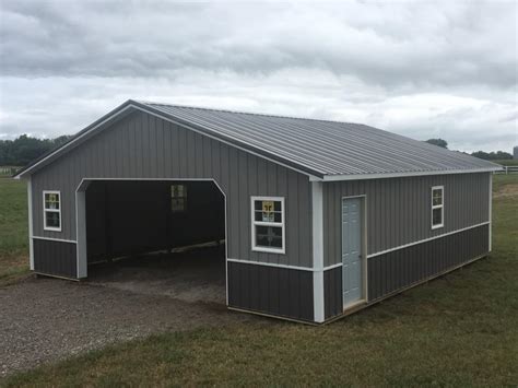 Pole barns are an inexpensive alternative to standard wood trusses and time consuming stick built methods. Pewter sides with charcoal roof and... - Pioneer Pole ...