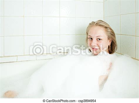 Woman In Bathtub Attractive Blonde Woman Enjoys In The Bathtub Canstock