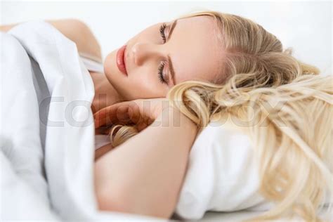 Beautiful Blonde Girl Sleeping In Bed Stock Image Colourbox