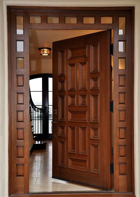 Due to the durability and lavish look wooden doors offer, entrance doors are prepared using this material. Custom Historical Reconstuction Main Entry Door by Glerup ...