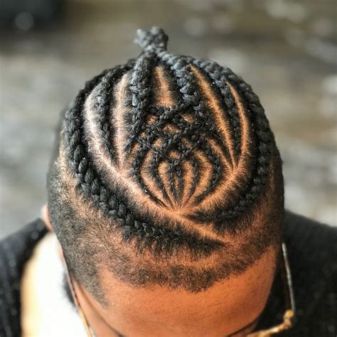 Male braids are uprooting classic haircuts for guys and just like the man bun, braided hair is becoming more socially acceptable. Braid Styles for Men, Braided Hairstyles for Black Man
