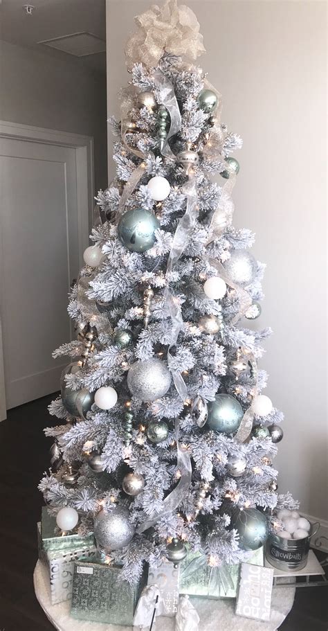 Maybe you would like to learn more about one of these? White, gold, silver and mint green christmas tree ...