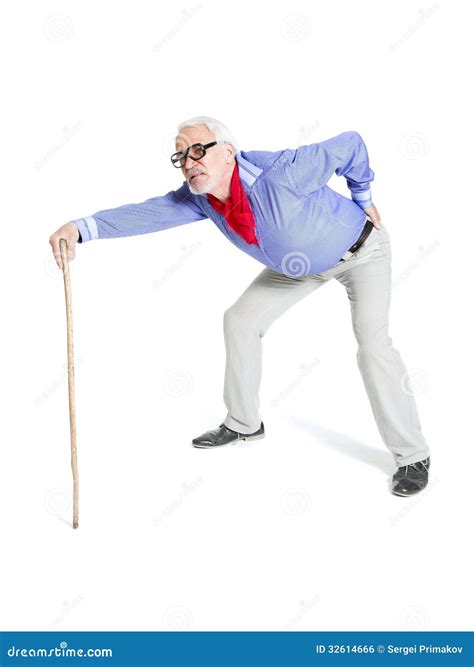 Full Length Portrait Of A Senior Man Walking With Cane Stock Photo