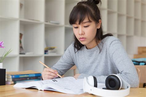 Asian Girl Female Teenager Studying At School Student Reading B
