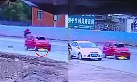 Video Shows Woman Being Dragged Under A Car In Hit And Run In China