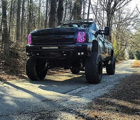 Lifted Chevy Silveado Truck Purple Neon Headlamps Jacked Up Trucks