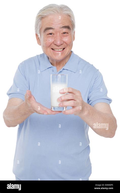 An Old Man Carrying Milk Stock Photo Alamy