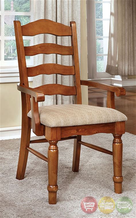 The wood ladder back dining chairs are named for the horizontal slats on the back, similar to the steps of the ladder. Country Style Dining Room Set | Oak Formal Dining Room Set
