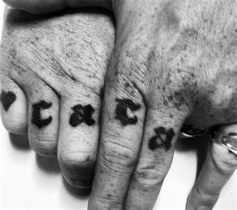 Josh Hommes Hand And Tattoos