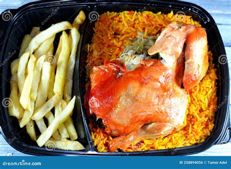 Chicken Mandi With Long Basmati Rice And French Fries Served With