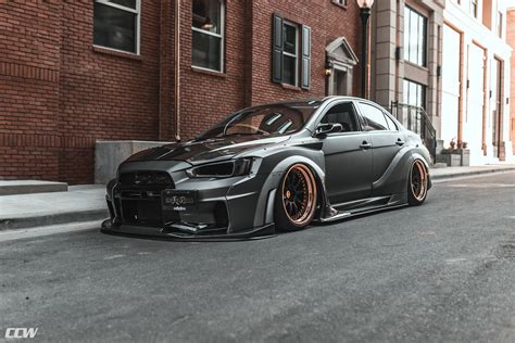 Front bumper extensions, front flares, rear flares, rear door extensions, rear bumper extensions, and all parts and body kits are cad engineered then precision milled using the most advanced technology in the automotive industry. Matte Gray Mitsubishi EVO X - CCW D110 Custom Carbon Fiber ...