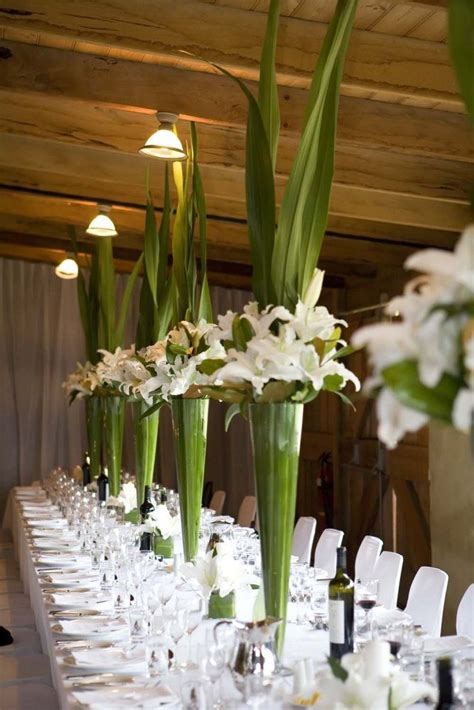 How to make a tall vase centrepiece with hydrangea and roses. Wedding Ideas for Stunning Tall Centerpieces - MODwedding ...