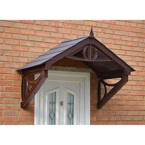 A unique rain awning specifically designed to resist rust and weathering, this excellent piece can be installed above a door or window to provide a safe shelter. Brown Rockingham Door Canopy | Over Door Awning on OnBuy