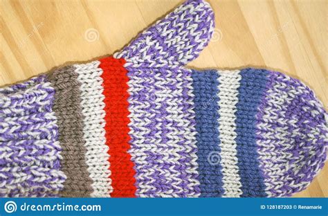 Bright And Colorful Handmade Knitted Mitten In Red Purple Blue And