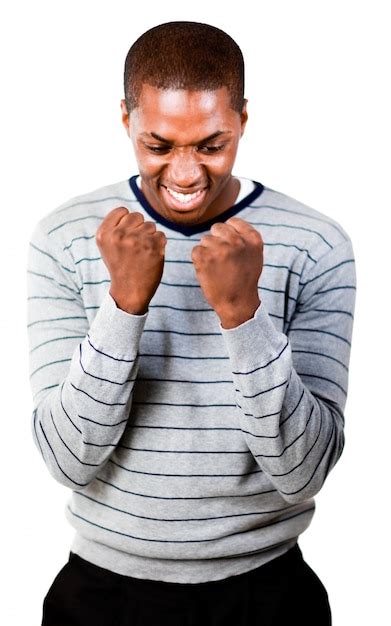 Premium Photo Young Man With Fists Clenched