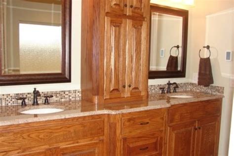 Bathroom wall storage is important to have, especially in small bathrooms where you have to take advantage of every nook and cranny. Bathroom Oak Cabinets Design, Pictures, Remodel, Decor and ...