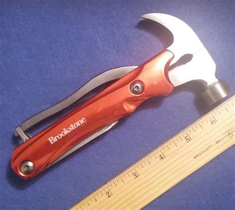 Brookstone 10n1 Multi Tool Hammer Wnail Claw And Plier Home Camping Auto