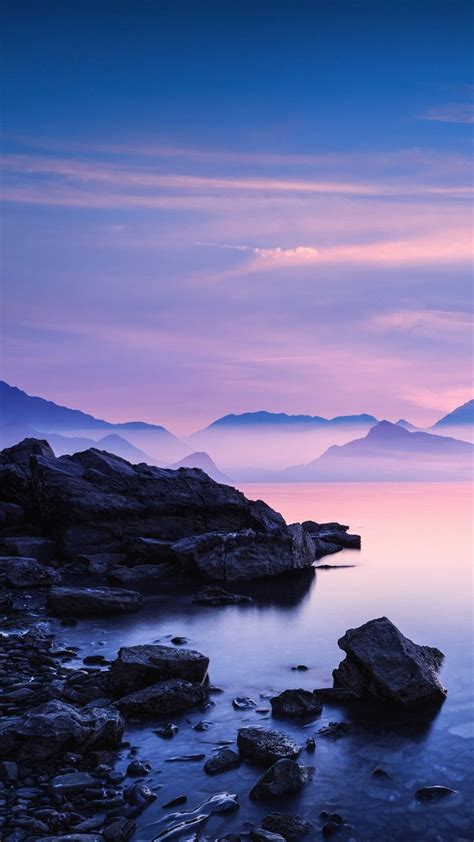 Sunset On A Sea Rocky Beach Pink Mountains Windows 10 Spotlight Images