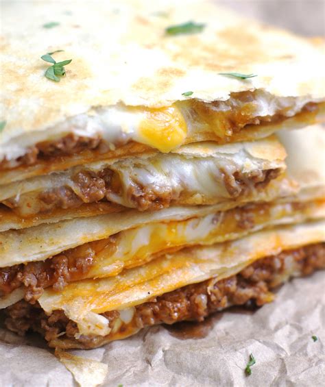 When the tortilla is golden on the first side, carefully flip the quesadilla to the other side, adding another 1/2 tablespoon butter to the skillet at the same time. Cheesy Ground Beef Quesadillas - 5 Boys Baker