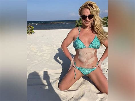 Britney Spears Flaunts Curvaceous Body In Naked Pool Pictures