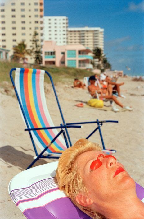 A Woman Tanning On The Beach Florida United States Photograph By Martin Martin Parr