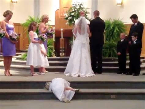 cute flower girl takes a nap steals the show goes viral