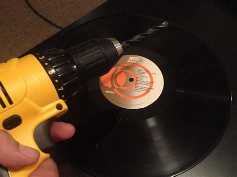 Tear off and use plenty of tape so that the silicone does not seep underneath. How to Make Your Own Vinyl Record Clock - Howchoo
