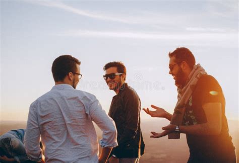 Three Men Standing While Laughing Picture Image 115976975