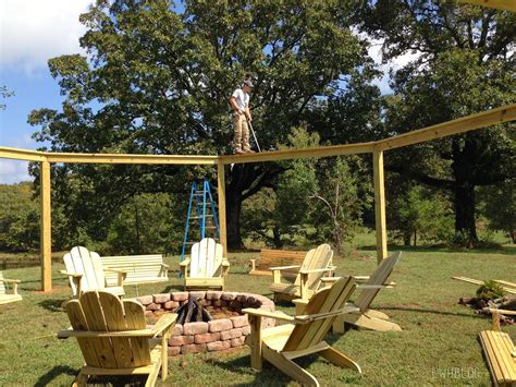 Remodelaholic Tutorial Build An Amazing Diy Fire Pit Pergola For Swings