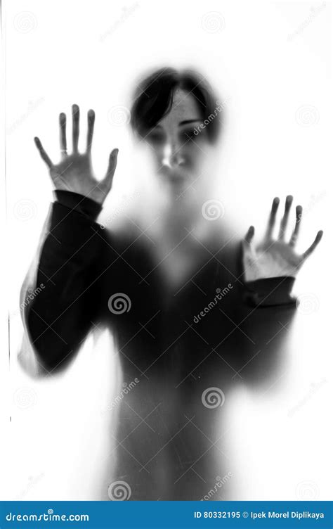 Shadowy Woman Figure Behind A Frosted Glass Stock Image Image Of