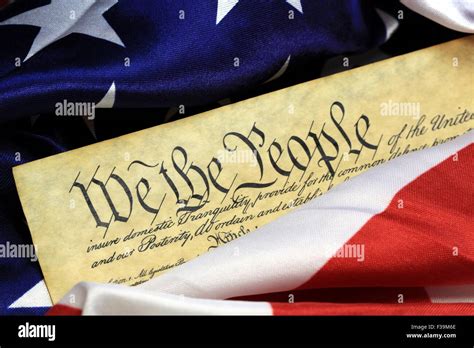 Historical Document Us Constitution We The People With American Flag