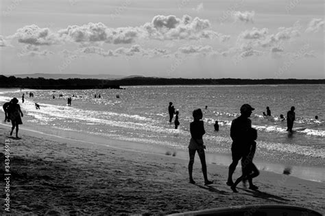 nossa heads sunshine coast australia queensland silhouettes of people on the beach at sunset