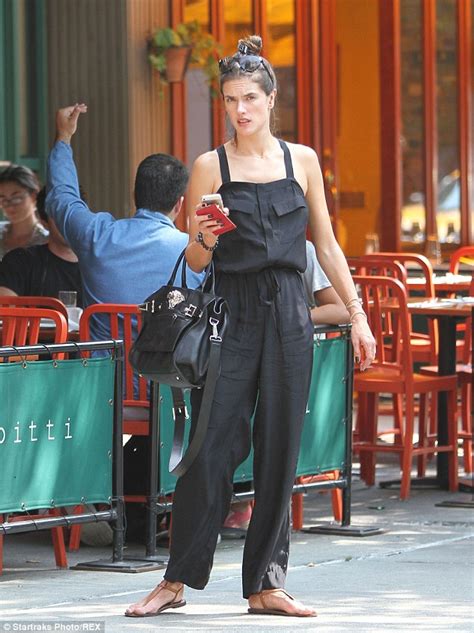 Alessandra Ambrosio Highlights Willowy Figure In Black Jumpsuit In New