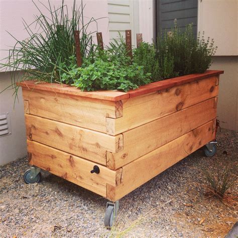 Raised garden beds on slopes need a bit more stability. putting wheels on a raised garden planter - Google Search ...