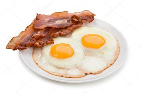 Plate With Fried Eggs And Bacon — Stock Photo © Timmary