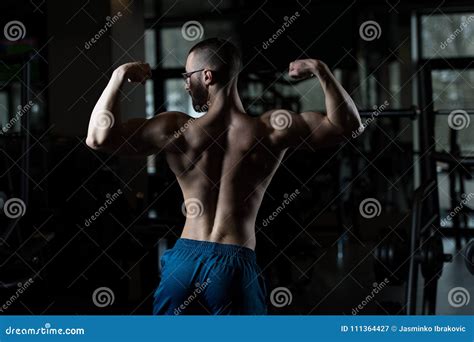 Nerd Man Standing Strong In Gym Stock Image Image Of Build Human