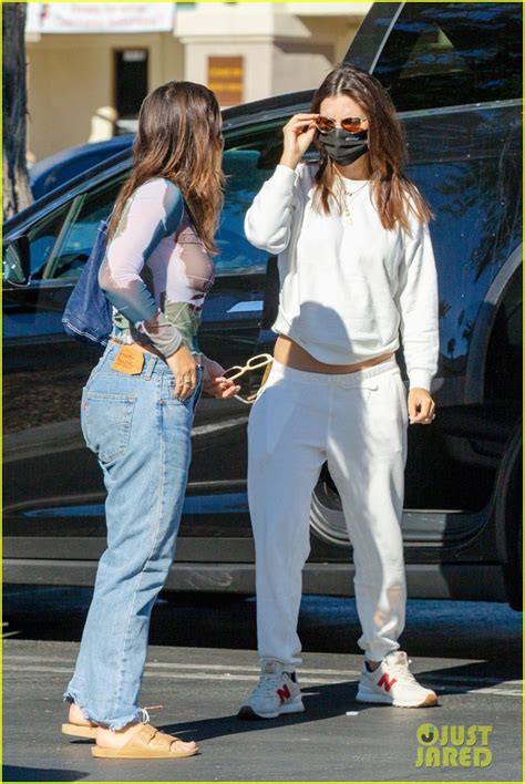 Emily Ratajkowski Cradles Baby Bump While Out With Friends Photo