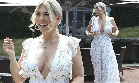 Frankie Essex Puts On A Busty Display In A Plunging White Maxi Dress